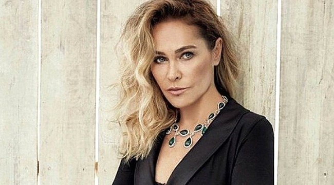 Hülya Avşar, kırmızı mini elbisesiyle genç kızlara taş çıkarttı