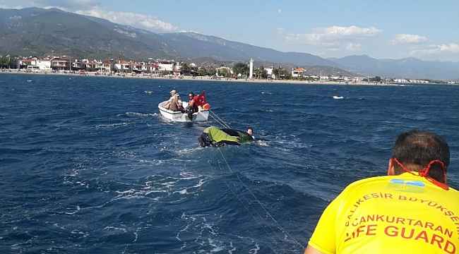 Edremit'te uçurtma sörfü yapan genç ve kurtarmaya gidenleri cankurtaranlar kurtardı