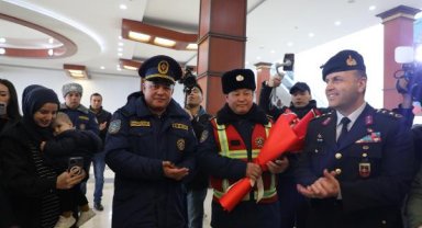 Kırgızistan ekibine duygusal karşılama