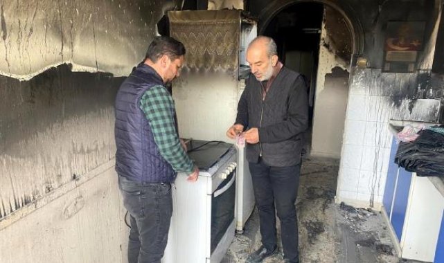 Belediye personeli, yanan evde bulduğu parayı sahibine teslim etti