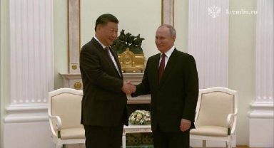 Çin Devlet Başkanı Cinping, mevkidaşı Putin ile bir araya geldi