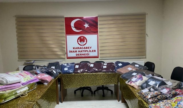 Karacabey'de kadınlar depremzedeler için eşofman ve pijama takımı dikiyor