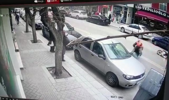 Motosikletini çalan hırsızı üstüne atlayarak yakaladı
