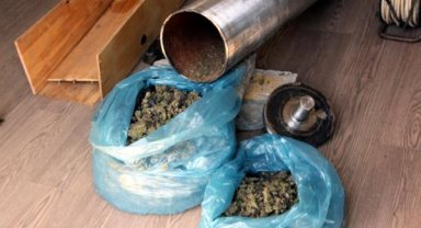 'Asır' ile otobüsteki aramada metal silindire gizlenmiş 15 kilo uyuşturucu bulundu
