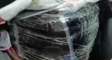 85 yaşında, beline sardığı afyon sakızı ile yakalandı
