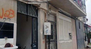 Kavgada tabancayla ateş edip, kapının arkasındaki komşusunu öldürdü