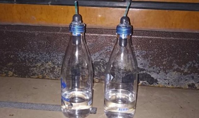 Boşanmak isteyen eşe silahlı molotoflu tehdit