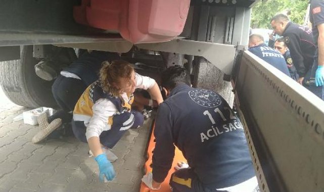 Sağlık görevlileri yaralıya ilk müdahaleyi TIR'ın altına yaptı