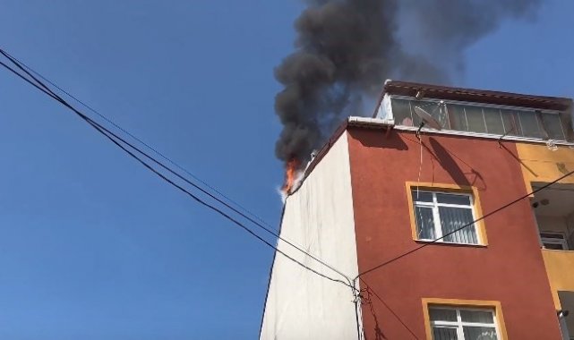 Arnavutköy'de yangında ilginç anlar: Genç kızı kurtardı, sigara yakıp itfaiyeyi bekledi