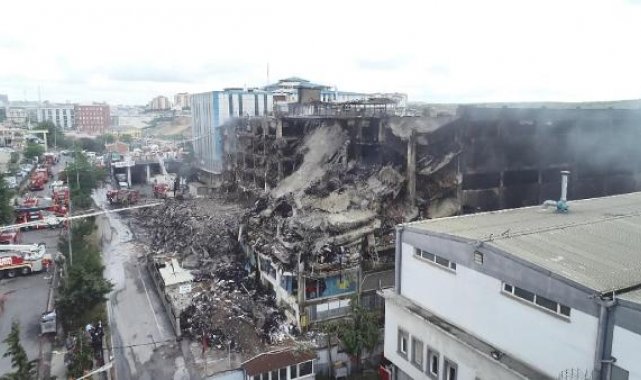 havadan görüntüyle Başakşehir'deki 4 gündür yanan binada itfaiye ekipleri arama yaptı