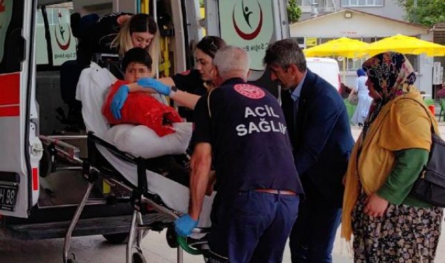 Kolu ot biçme makinesine sıkışan Muhammed, itfaiye ekiplerince kurtarıldı