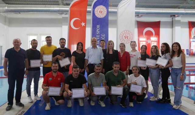 Şampiyon özel sporculara başarı belgesi