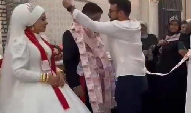 Damada arkadaşlarından paralarla 45 metrelik takı