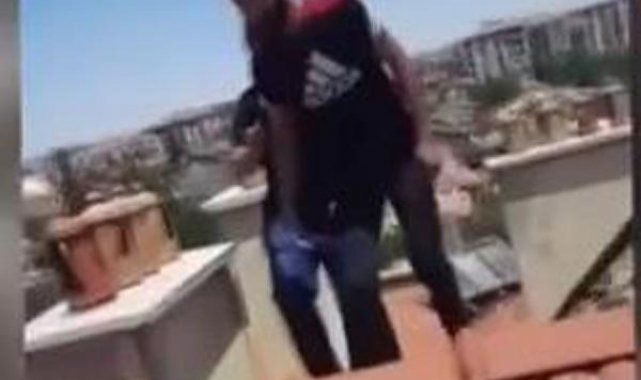 Polise yakalanmamak için çatıya çıktı