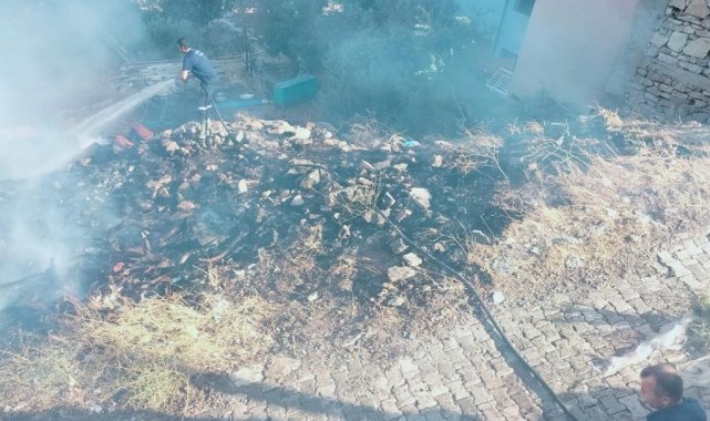 Çöp yangını, evlere sıçramadan söndürüldü