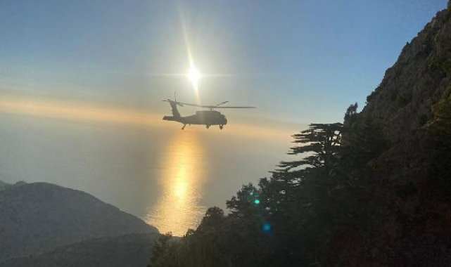 Kayalıklara düşen Belaruslu paraşütçü askeri helikopterle kurtarıldı