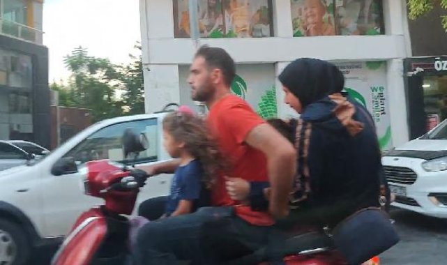 Motosiklette 5 kişilik ailenin tehlikeli yolculuğu kamerada