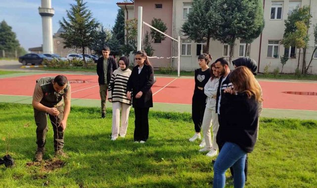 100 fidan toprakla buluştu