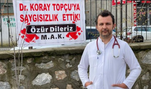 Tartıştıkları doktordan pankartla özür dilediler
