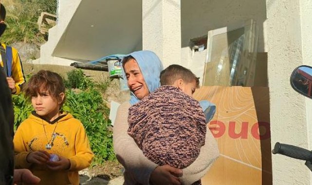 Yangında mahsur kalan anne ve 5 çocuğunu komşuları kurtardı