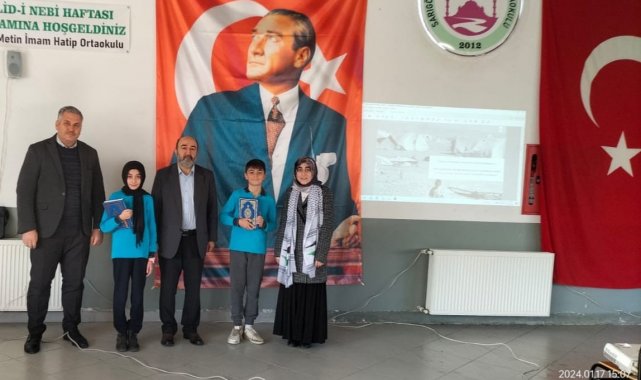 Okul birincilerine Kur'an-ı Kerim hediye edildi
