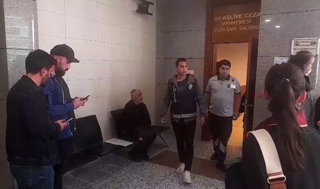 Kediyi camdan aşağı ittirerek yaralanmasına neden olduğu iddia edilen sınav gözetmeni hakim karşısında