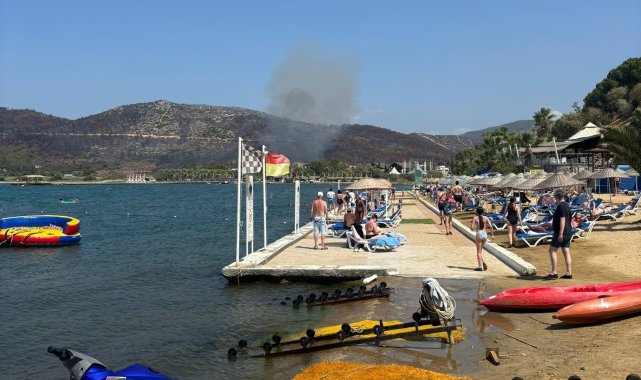 Kuşadası'ndaki orman yangını büyümeden söndürüldü