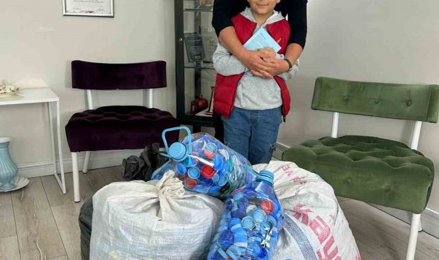 7 yaşındaki öğrenci, engelliler için kapak topladı