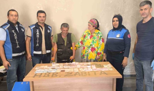 Üzerinde fazla parayla yakalanmak istemeyen dilencinin para oyununu zabıta bozdu