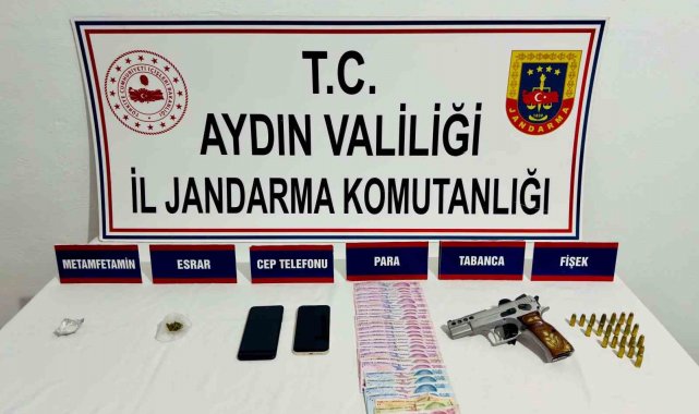 Kuşadası'nda ruhsatsız tabanca ve uyuşturucu ele geçirildi