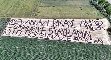Azerbaycan'ın bağımsızlık gününü tarlasına yazdığı yazıyla kutladı