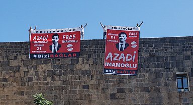 Diyarbakır'da surlara asılan 'İmamoğlu' pankartlarına polis el koydu - Yeniden