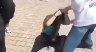 Lise öğrencisi, ortaokul öğrencisini saçlarından tutup yerde sürükledi