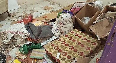 Aydın'da kötü koku yayılan evden 6 kamyon dolusu çöp çıktı