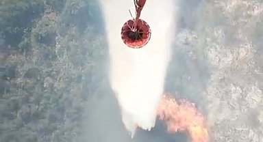 Balıkesir'de tarım arazisinden çıkıp, ormana sıçrayan yangın 2'nci gününde