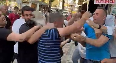 Boşanan çift ile yakınları arasındaki kavga kamerada