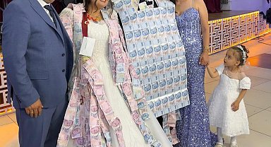 Düğünde damada paradan yelek giydirdiler