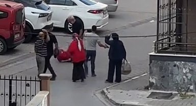 Eşinin bıçakla rehin aldığı kadın, çevredekilerin de yardımıyla kurtarıldı
