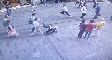 İstanbul - Taksim'de 68 suçtan aranan şüphelinin kovalamaca sonucu yakalandığı anlar kamerada