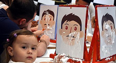 Kitabevinin 'babalar günü' etkinliğinde, çocuklar babalarıyla oyunlar oynadı