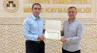 Midyat Kaymakamı Özdemir'den DHA muhabirine teşekkür belgesi