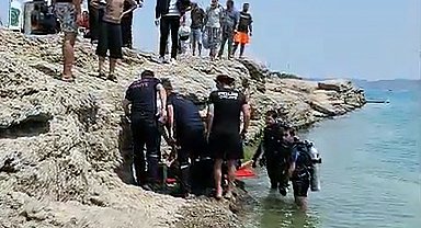 Serinlemek için girdiği baraj gölünde kayboldu, dalgıç polisler buldu