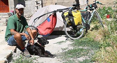 Şili'den bisikletle yola çıkıp köpeğiyle 80 ülke gezdi