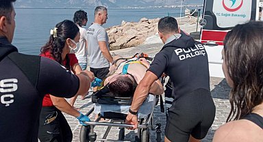 SUP board yaparken denizde fenalaşıp, boğulma tehlikesi geçirdi