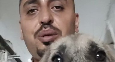 Ağır hasarlı binaya girip yavru köpeği kurtardı