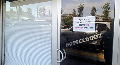 Bingöl'de sıcaklık 40 dereceyi aştı; işçiler hortumla serinledi, bazı esnaf dükkanını kapattı