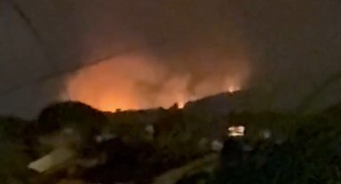 İzmir'de çöplükte çıkan yangın makilik alana sıçradı