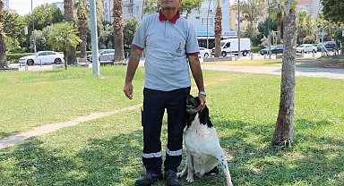 Temizlik görevlisinin sokak köpeği ile bağı dikkat çekiyor: O benim 3'üncü çocuğum
