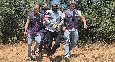 Yakalanmamak için dağda yaşayıp, ayı kapanı kurmuş