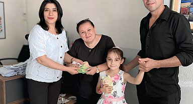 8 yaşındaki Nida Nur, bulduğu içinde 1700 avro olan cüzdanı sahibine teslim etti